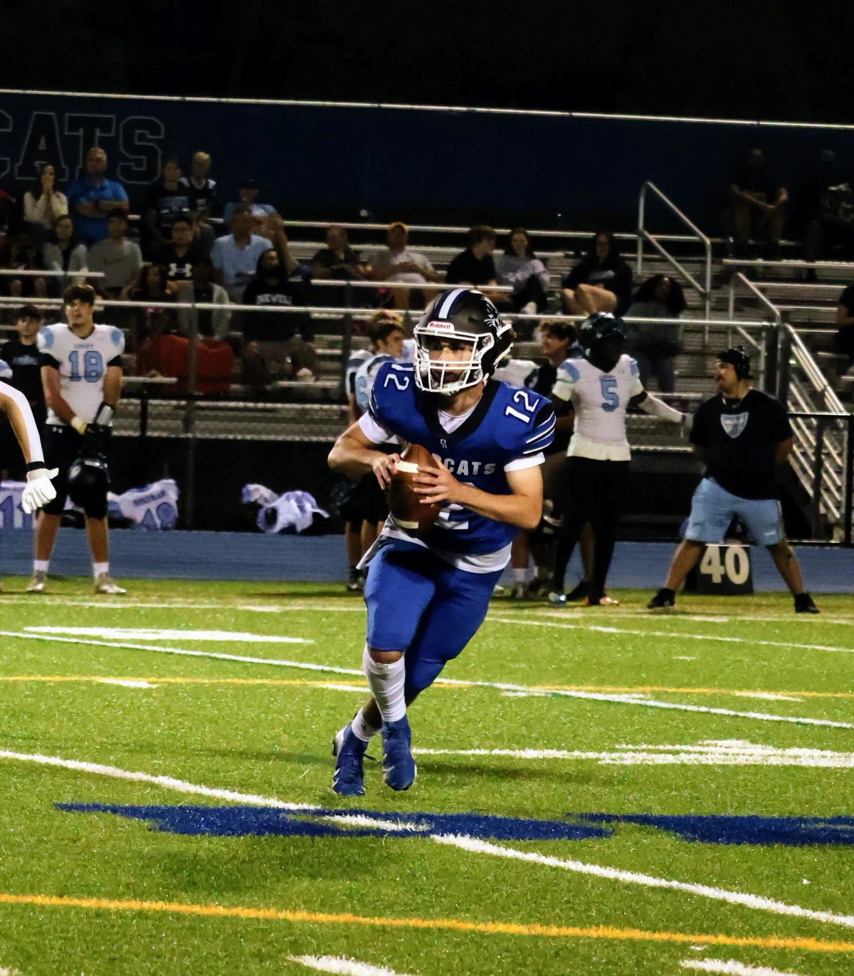 Gavin playing high school football